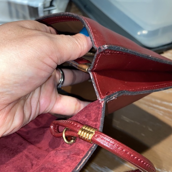 Philippe Oversized wristlet. Chocolate color with red under tone. - Picture 13 of 13